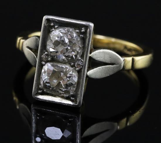 An 18ct gold, platinum and two stone diamond rectangular tablet ring, size P.